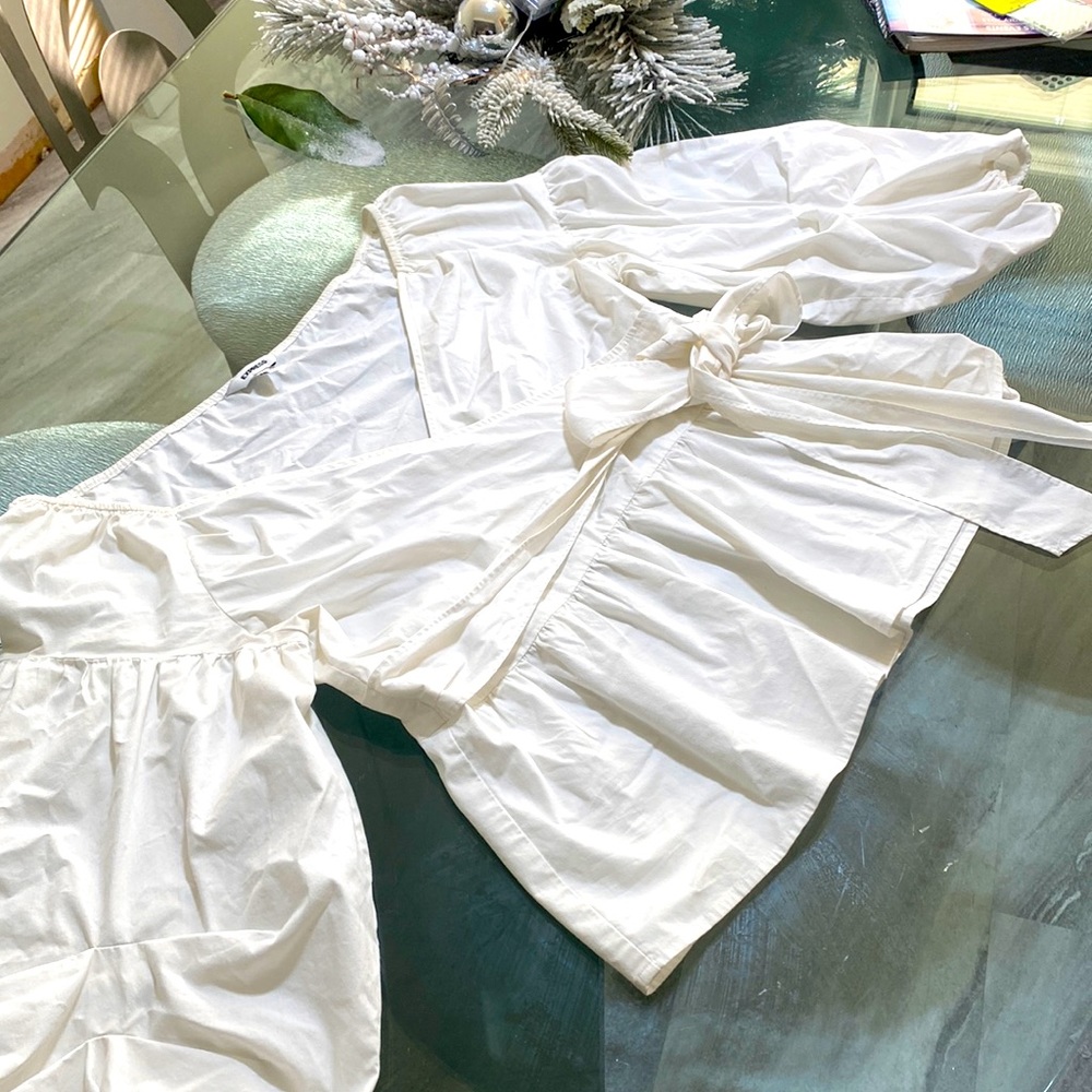 Elegant  white blouse with fluffy sleeves